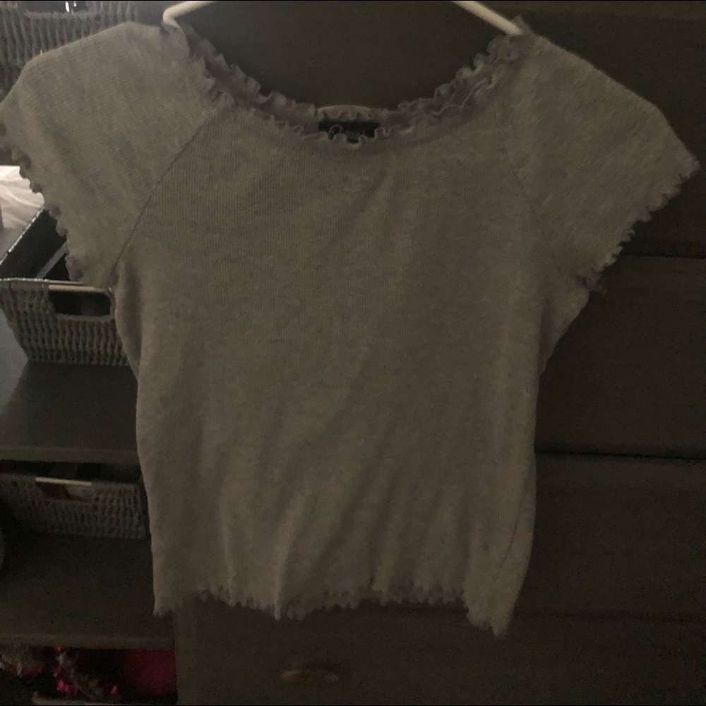 a grey shirt